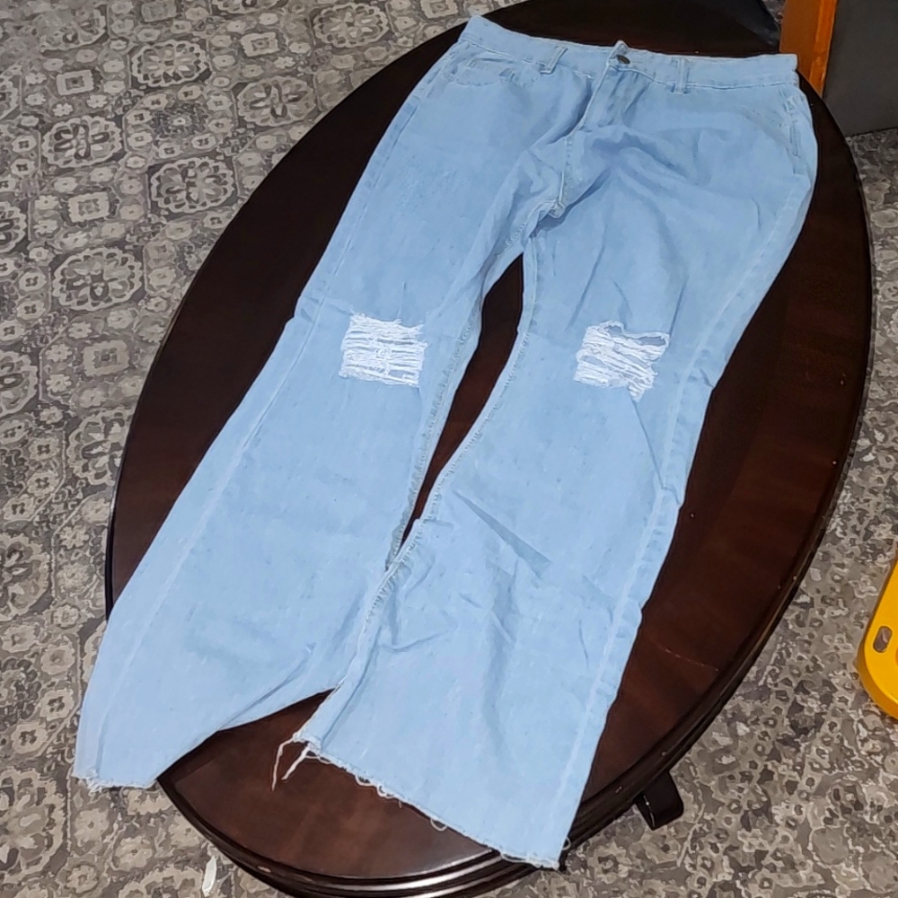 Womens size unknown light blue high rise flare bottom jeans